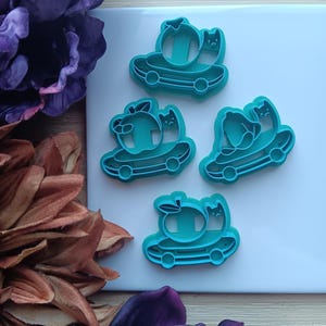 Snail skateboard polymer clay cutter - Apple worm, Orange, Bomb, Bell flower