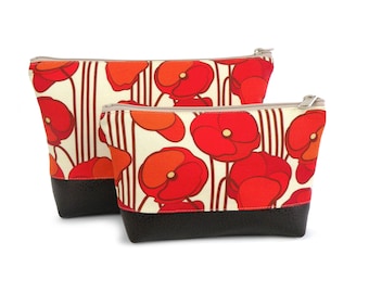 Poppy toilettas oranje: vegan clutch van imitatieleer