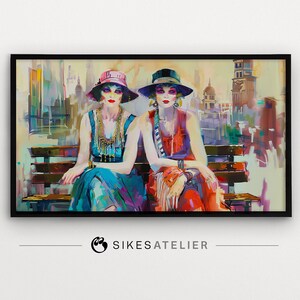 May include: Two women wearing hats and colourful dresses sit on a bench in front of a city skyline. The woman on the left is wearing a pink hat and a blue dress. The woman on the right is wearing a black hat and a red dress. The painting is done in a vibrant, colourful style.