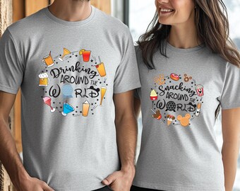May include: Two grey t-shirts with a circle of Disney-themed food and drink icons. The left shirt says "Drinking Around the World" and the right shirt says "Snacking Around the World".