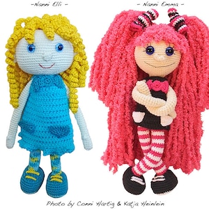 May include: Two handmade crochet dolls, "Nanni Elli" and "Nanni Emma", are displayed. "Nanni Elli" has yellow curly hair and a blue dress. "Nanni Emma" has pink, fluffy hair and a black dress. The dolls are on a white background.