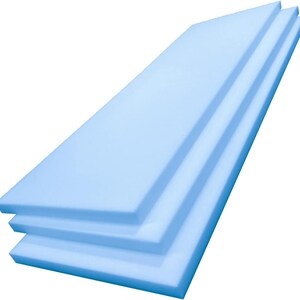 May include: Three light blue foam insulation boards stacked diagonally. The boards are rectangular and have a smooth surface. The image is a studio shot with a white background.