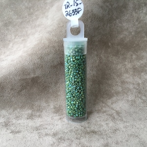 15-2633F, Semi Glazed Rainbow Clover, 15/0 Seed Bead by Toho