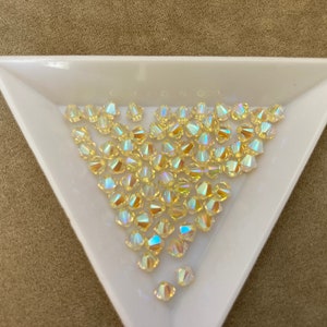 Swarovski 4mm Bicone, Jonquil AB2x, package of 72