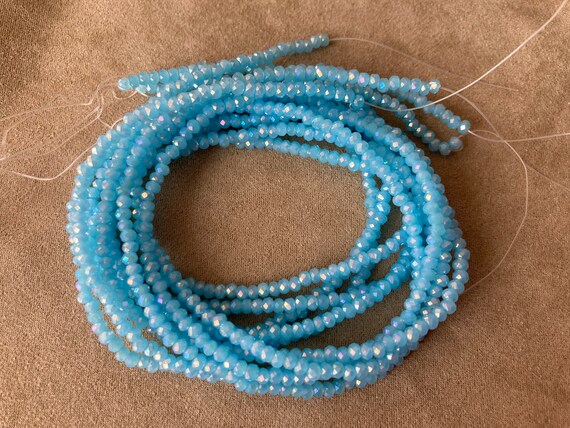 Chinese Crystal Rondelle Beads 3x2mm BLUE OPAL AB
