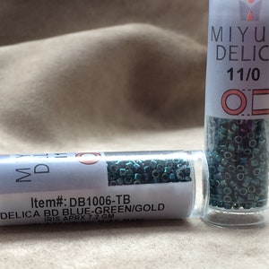 Delica 11/0, DB1006, Blue Green Gold Iris by Miyuki