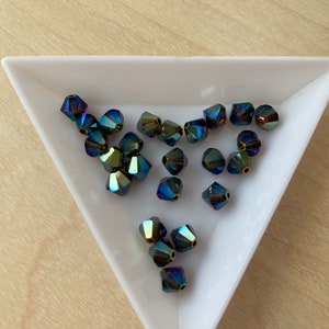 Swarovski 6mm Bicone, Crystal Iridescent Green 2x, package of 24, Article 5328 / 5301