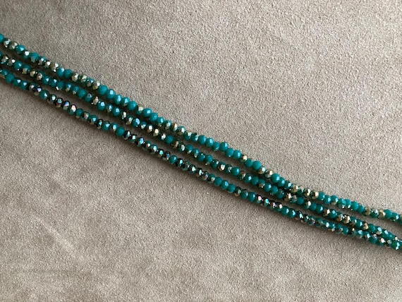 Chinese Crystal Rondelle Beads 3x2mm JADE GREEN AB