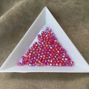 Swarovski 3mm Bicone, Light Siam AB2x, package of 72