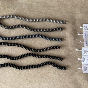 Czech 2 Hole Lentil, 6x2.4mm, 50 bead strand, Grays & Black