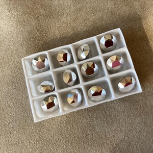 Lot de 12, Swarovski Art. 1088, 39SS / 8 mm, Crystal CAL (Comet Argent Light) déjoué