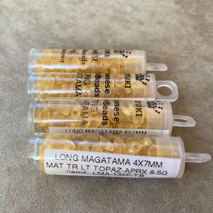 LMA-132F, Matte Tr Light Topaz, 4 Tube Lot, Long Magatama, 4x7mm