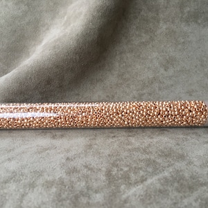 11-PF551 / P481A, PermaFinish Galvanized Rose Gold, 11/0 Seed Bead by Toho