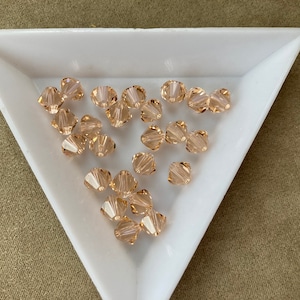 Swarovski 6mm Bicone, Light Peach, package of 24, Article 5328 / 5301