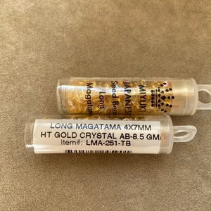 LMA-251, Light Gold Crystal AB, 2 Tube Lot, Long Magatama, 4x7mm