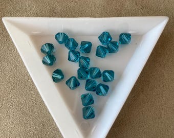 スワロフスキー 6 mm バイコーン、インディコライト、24個入り、品番