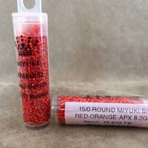 15-10, Miyuki 8.2g Silver Lined Flame Red 15-10, Miyuki 8.2g Silver Lined Flame Red