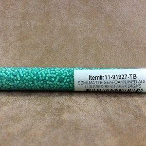 11-91927, Semi-Matte Seafoam Lined Aqua, 11/0 Seed Bead di Miyuki