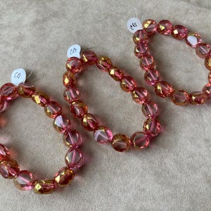 Czech Polished Table Cut Oval, Rose & Gold Faceted Edge, 15 bead Strand, 12x7mm