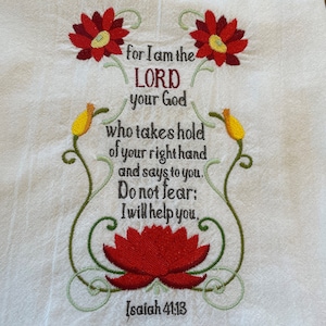 May include: Embroidered kitchen towel with a red floral design and the text "for I am the LORD your God who takes hold of your right hand and says to you. Do not fear; I will help you. Isaiah 41:13"