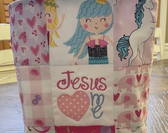 Personalized toddler patchwork Jesus Loves Me fabric tote, 9" x 11", pink fabrics and machine embroidery