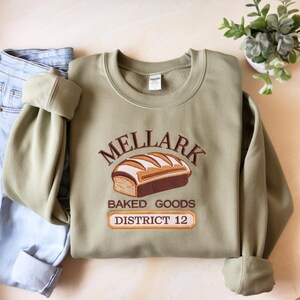 Embroidered Mellark Bakery Sweatshirt, District 12 Embroidered Shirt, Mellark Baked Goods Everdeen Apothecary Odair Fisherie Shirt