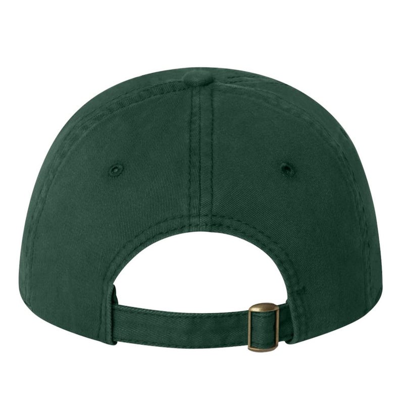 May include: A dark green baseball cap with an adjustable strap and buckle closure.