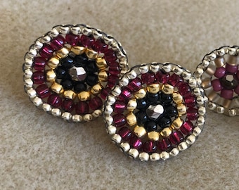 Suzanne mandala beaded post earrings - pomegranate red, black, silver, and gold Japanese seed beads stitched by hand