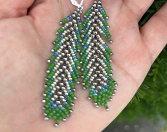 long feather fringe beaded earrings in green, silver and stainless steel metal on sterling lever back ear wires