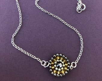 gold and steel gray beaded mini mandala focal necklace on 16 inch delicate rolo chain