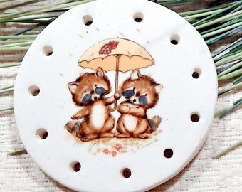 RACCOONS Iin the RAIN   round clay base for pine needle basketry- 2 1/4" diameter