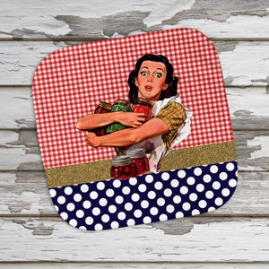 May include: A red and white gingham and blue polka dot coaster with a vintage image of a woman holding jars of preserved food.