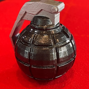 Grenade bomb pot button for mixed poker games.  Custom 3D printed and hand painted to Order