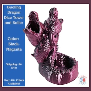 May include: A 3D printed black and magenta dual-headed dragon dice tower and roller. The dragon is curled up with its heads facing upwards, forming a dice tower. The dragon has a textured surface and a shiny finish.