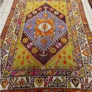 1940s Turkish Wool Rug: Handwoven Avanos Carpet with Tribal Medallion (6x8.5 ft)
