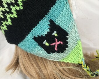 Sad Kitty Earflap hat hand knit hand dyed intarsia cat face black fleece lined fair isle fur pompon hat