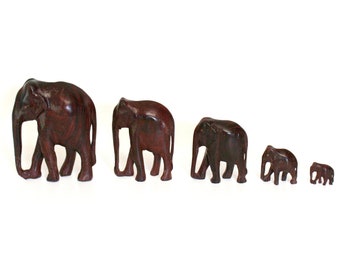 Set of Five Carved Wooden Elephant Figurines in Graduated Sizes