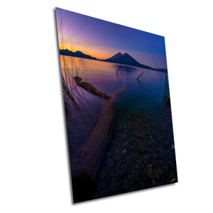 Sunrise on Lake Atitlan overlooking its amazing volcanoes in Guatemala, a photograph printed on paper, canvas, acrylic or metal