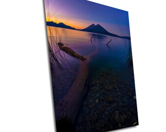 Sunrise on Lake Atitlan overlooking its amazing volcanoes in Guatemala, a photograph printed on paper, canvas, acrylic or metal