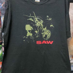 Vintage Saw Horror Movie T-Shirt, manda Young Saw Vintage T-Shirt, Saw Horror Movie Gift For Women and Man Unisex T-Shirt