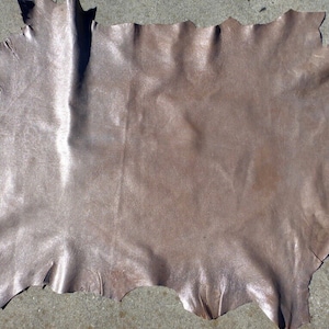 calfskin leather hide Large Distressed Metallic Wash on Brown Grainy Texture