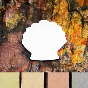 May include: White seashell cutout with a smooth, rounded shape. The seashell is on a textured, brown, orange, and green background.