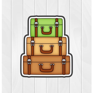 May include: Three vintage suitcases stacked on top of each other. The top suitcase is green, the middle suitcase is brown, and the bottom suitcase is brown with a lighter shade of brown.