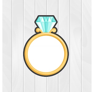May include: A gold ring with a large, clear blue diamond on top. The ring is on a white wood background.