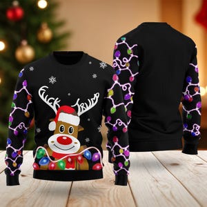 May include: Black Christmas sweater featuring a reindeer wearing a Santa hat and a red scarf, with the text "Fuck Trump" above the antlers. The sleeves are decorated with colorful Christmas lights. Snowflakes are scattered around the reindeer.
