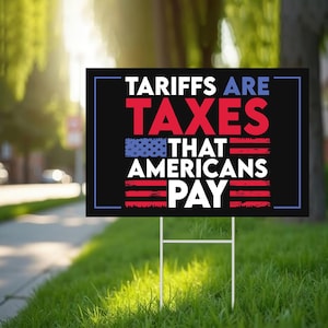 May include: A black and white yard sign with red, white, and blue accents. The sign reads "Tariffs are Taxes That Americans Pay".