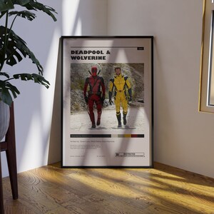 K&ouml;nnte beinhalten: Ein Filmplakat f&uuml;r Deadpool & Wolverine, mit Deadpool in einem rot-schwarzen Anzug und Wolverine in einem gelben Anzug. Das Plakat hat eine rote "R"-Bewertung und den Text "Deadpool & Wolverine" in wei&szlig;er Schrift.