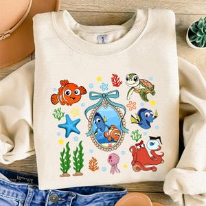 Cartoon Fish Character Coquette Bow Png, Magical Kingdom, Boy Girl Birthday Trip Png, Trendy Cartoon Magical Mirror Bow Png