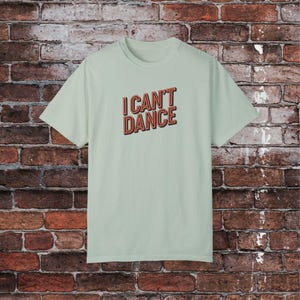 Funny &#39;I Can&#39;t Dance&#39; Unisex T-shirt, Humorous Dancing Tee, Playful Dance Shirt, Sarcastic Typography Top, Joke Dance Skill Gift