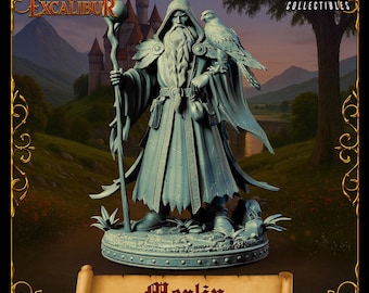 May include: A detailed statue of Merlin from the Chronicles of Excalibur. The figure is depicted in a long robe, holding a staff with a crystal ball, and has a falcon perched on his arm. The base reads "Merlin".